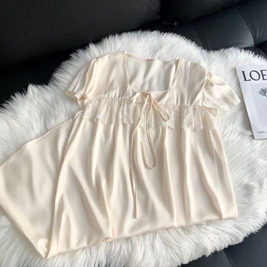 Minimalist-style apricot lace nightgown with a bow for women.