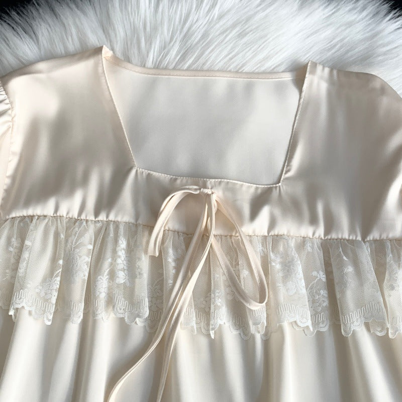 Minimalist-style apricot lace nightgown with a bow for women.